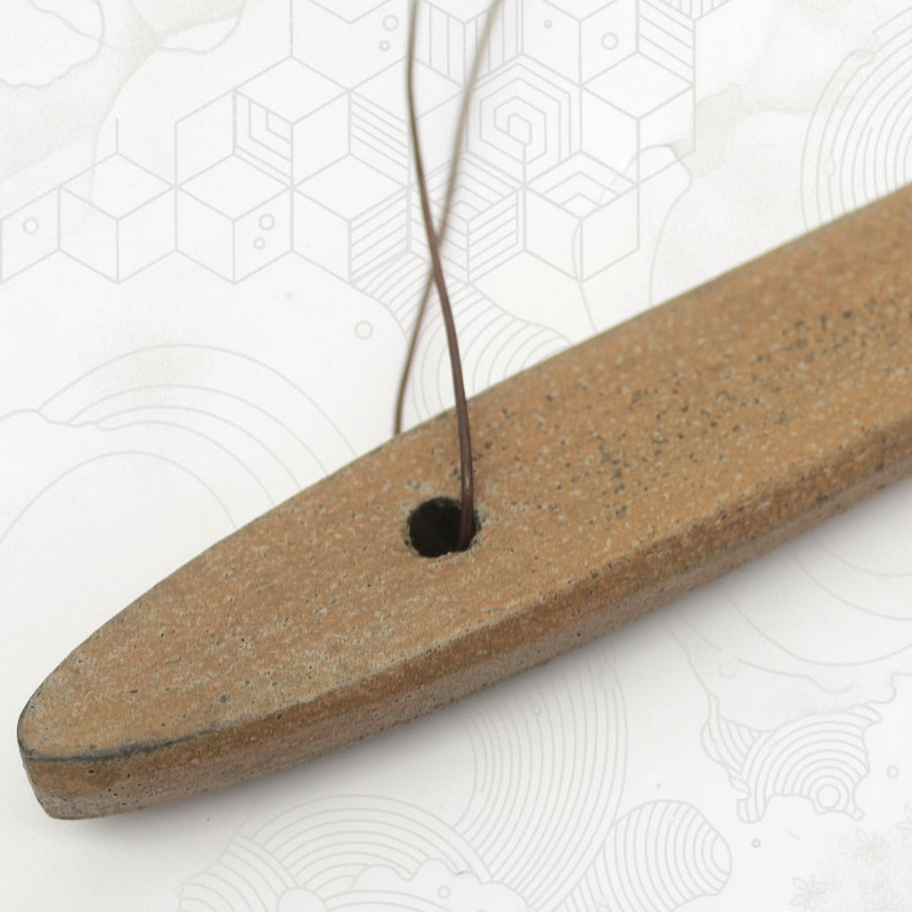 Primitive mustard wooden candle holder