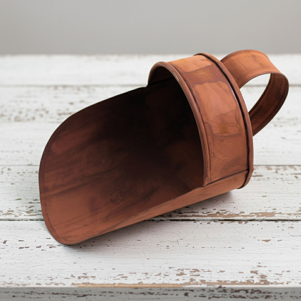 Rusty tin metal decorative grain scoop