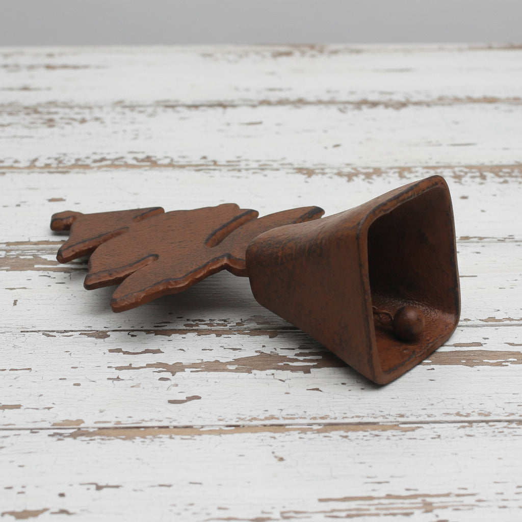 Decorative cast iron bell with Christmas tree design