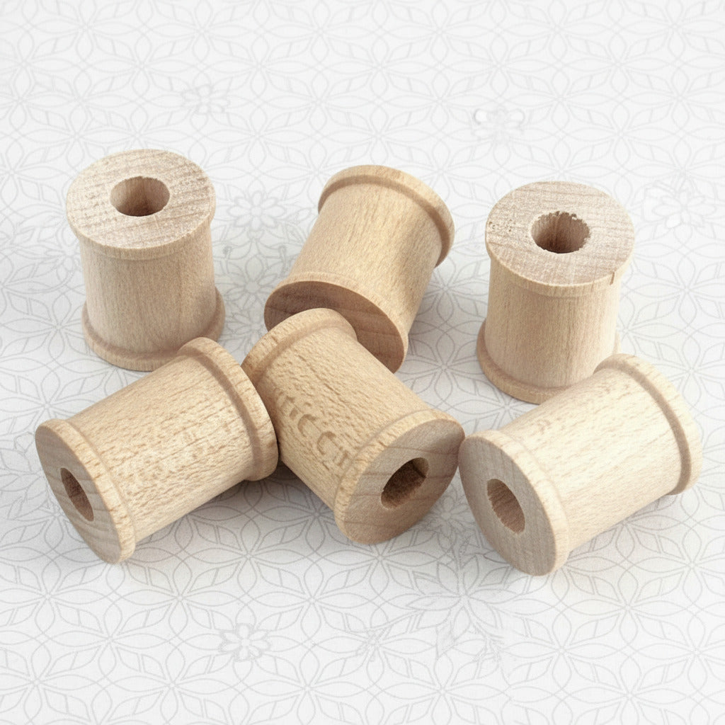 Miniature unfinished wooden spools