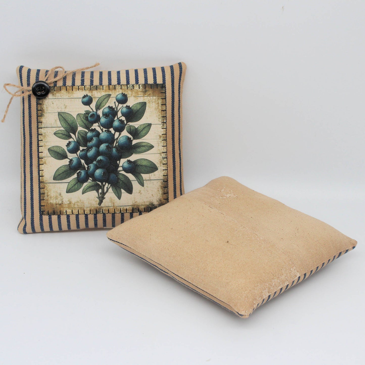 Set of two fabric mini pillow bowl fillers with images of blueberries and strawberries