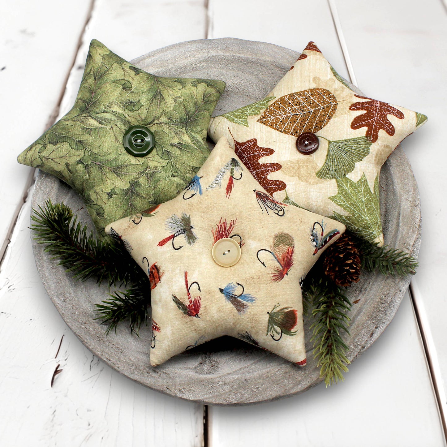 Set of three fabric stars bowl fillers with woodland forest and fishing themed designs