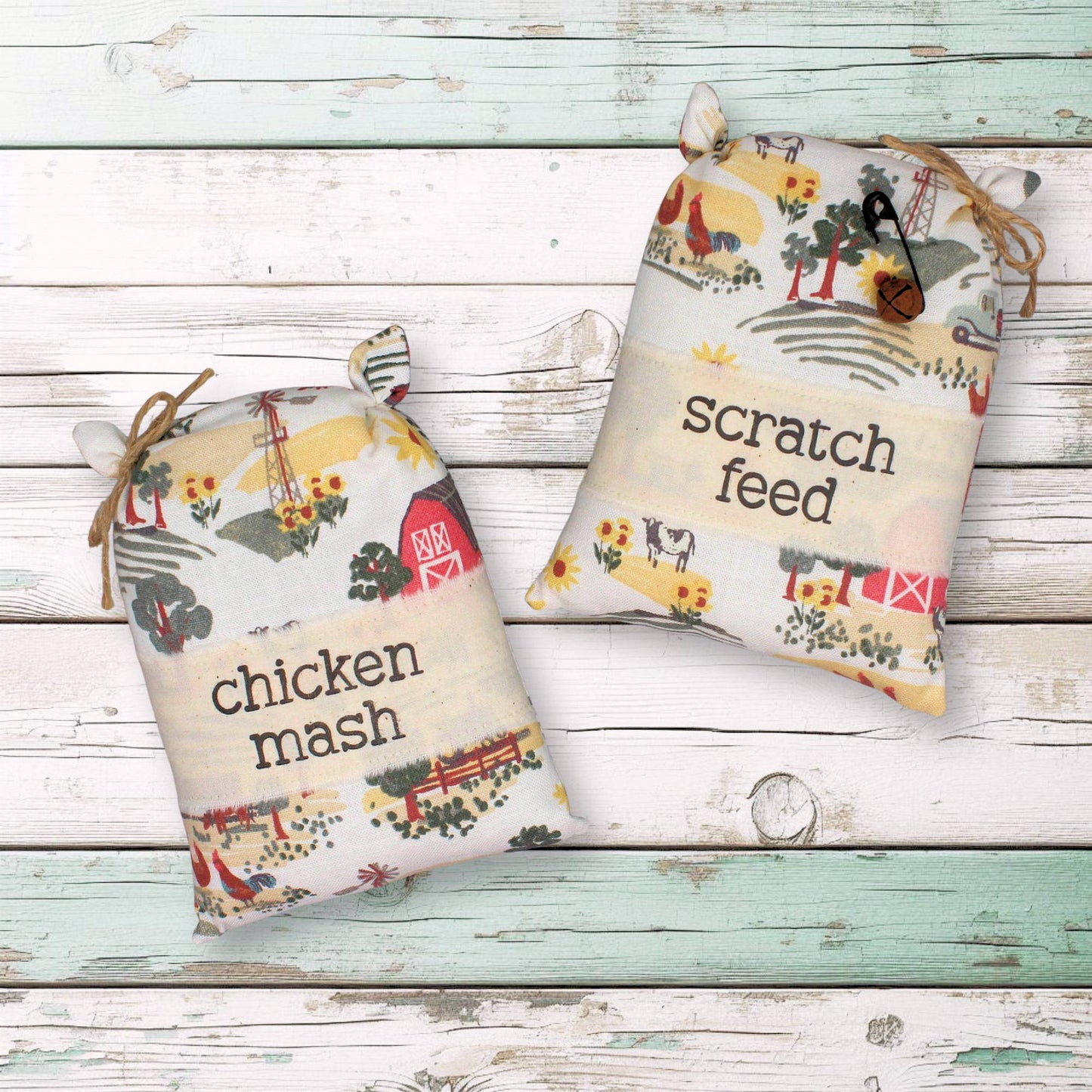 Two decorative grain sack bowl fillers with farm-themed designs and text on a wooden surface.