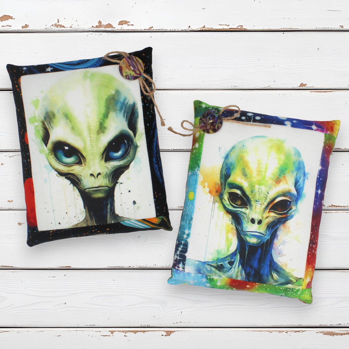 Set of two mini pillows for Halloween decorating with images of creepy green space aliens