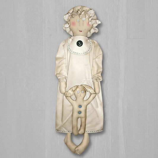 Textile art doll with her baby bunny rabbit getting ready for bed