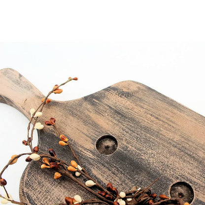 wooden bread board candle holder with pip berries