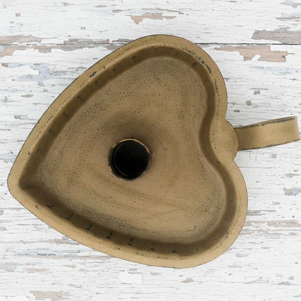 Heart-shaped tin colonial primitive mustard taper candle holder