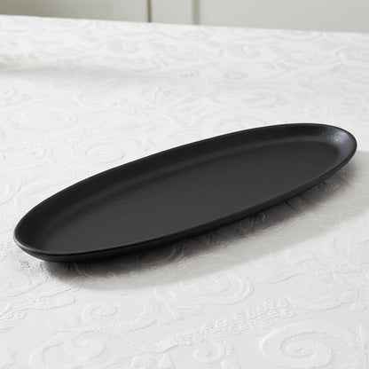 Black oval tray on a white background