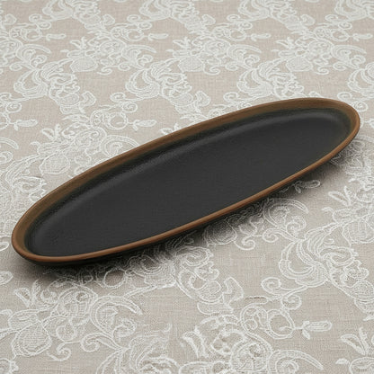 Black oval tray with brown rim on a white background