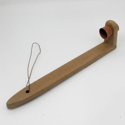 Primitive mustard wood taper candle holder