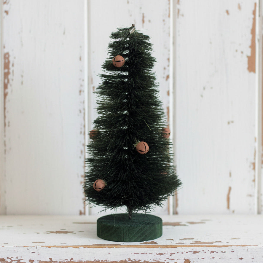 Primitive sisal tree with rusty bells