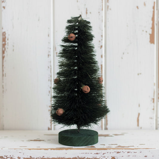 Primitive sisal tree with rusty bells