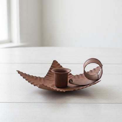 Rusty tin star candle holder