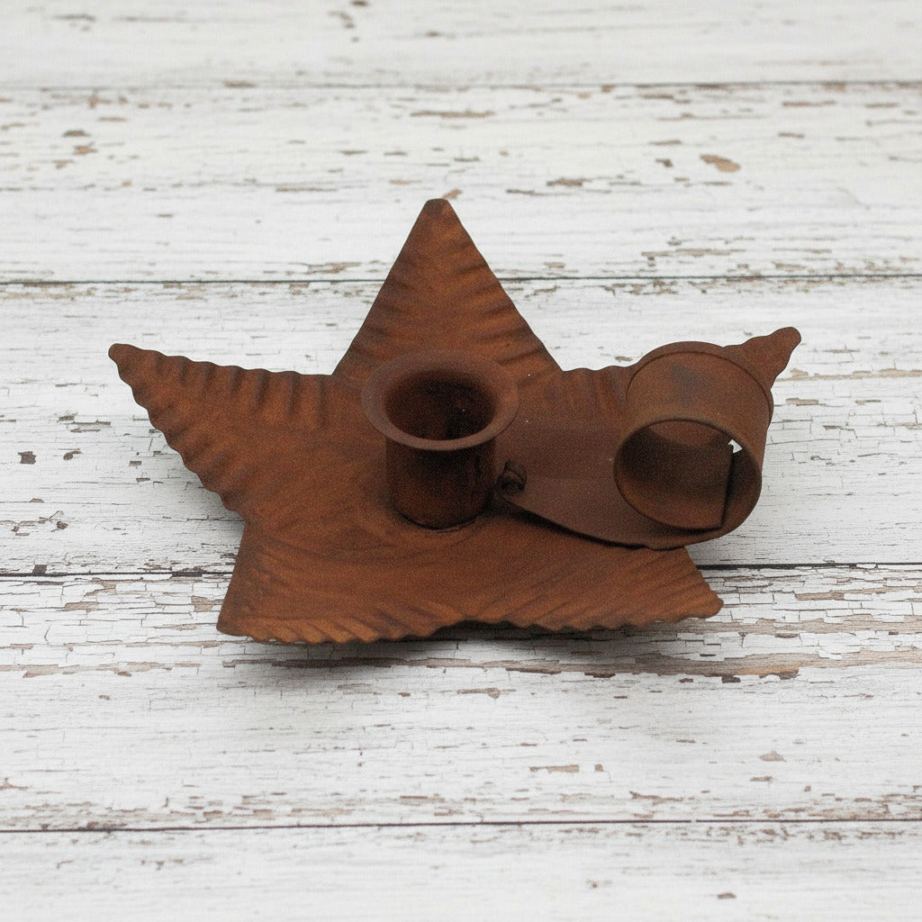 Rusty tin star taper candle holder