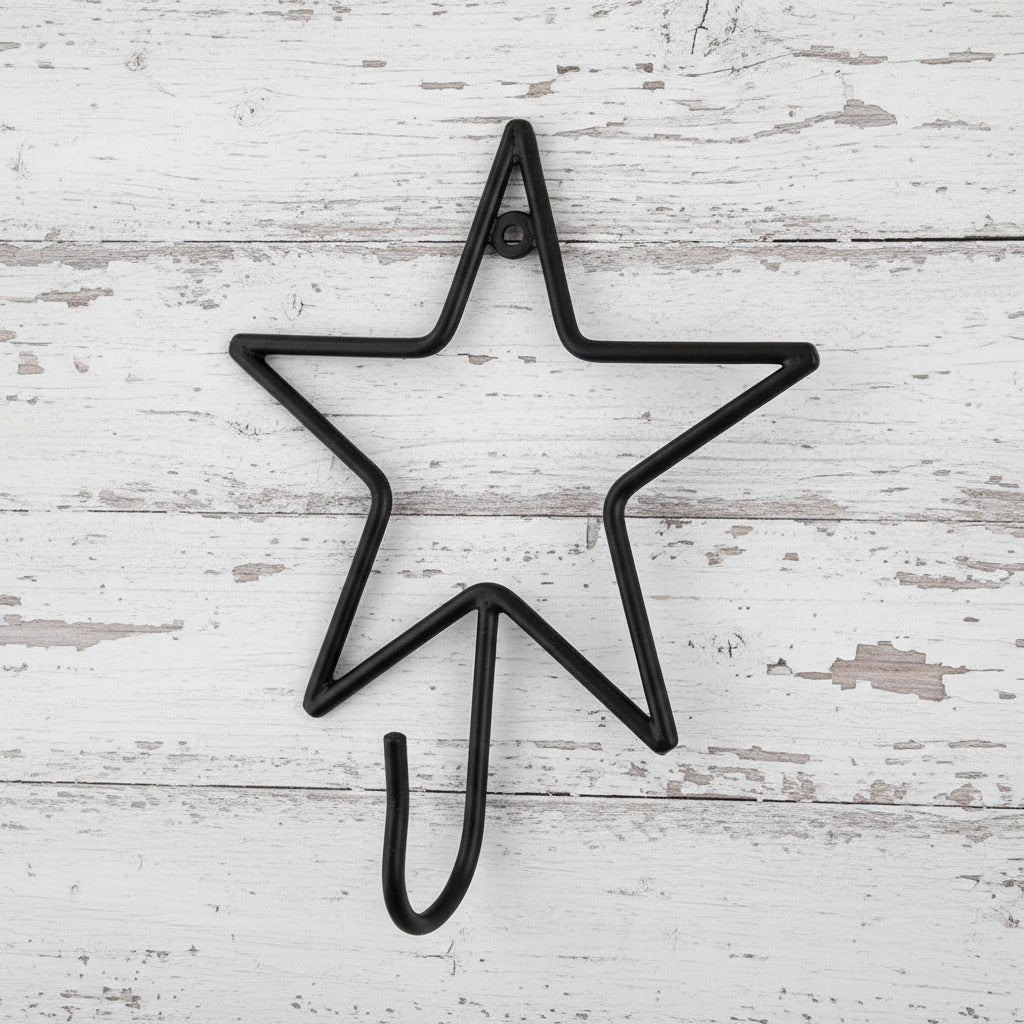 Black star-shaped hook on a white background