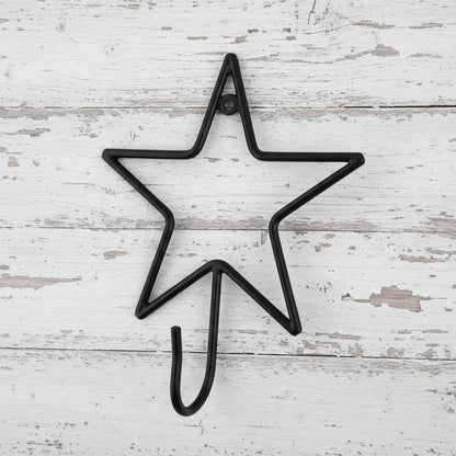 Black star-shaped hook on a white background