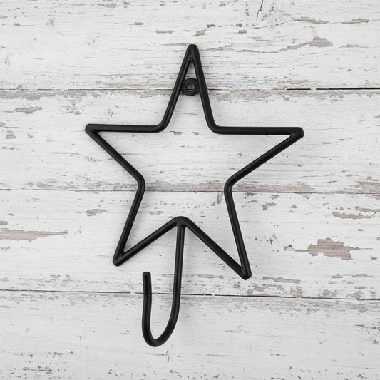 Black star-shaped hook on a white background