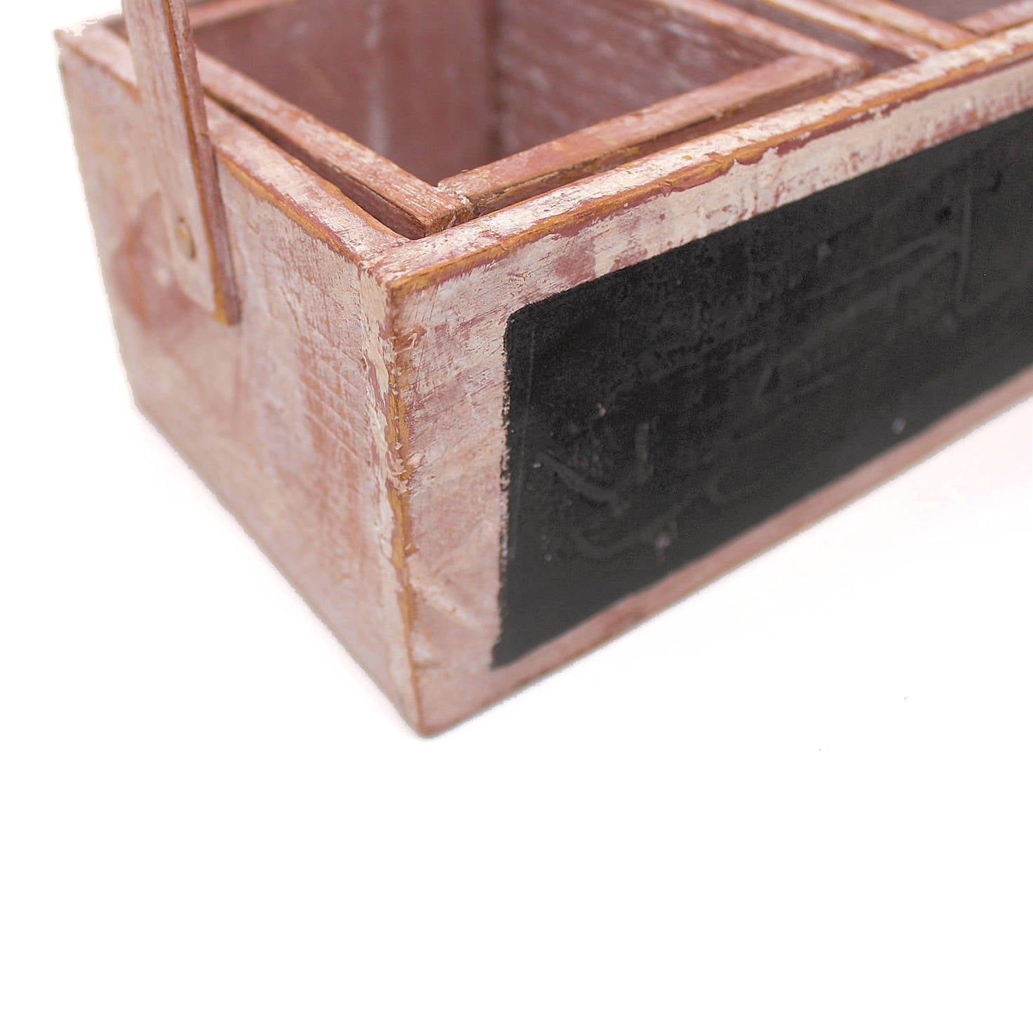 Closeup of distressed wooden planter box caddy with chalkboard