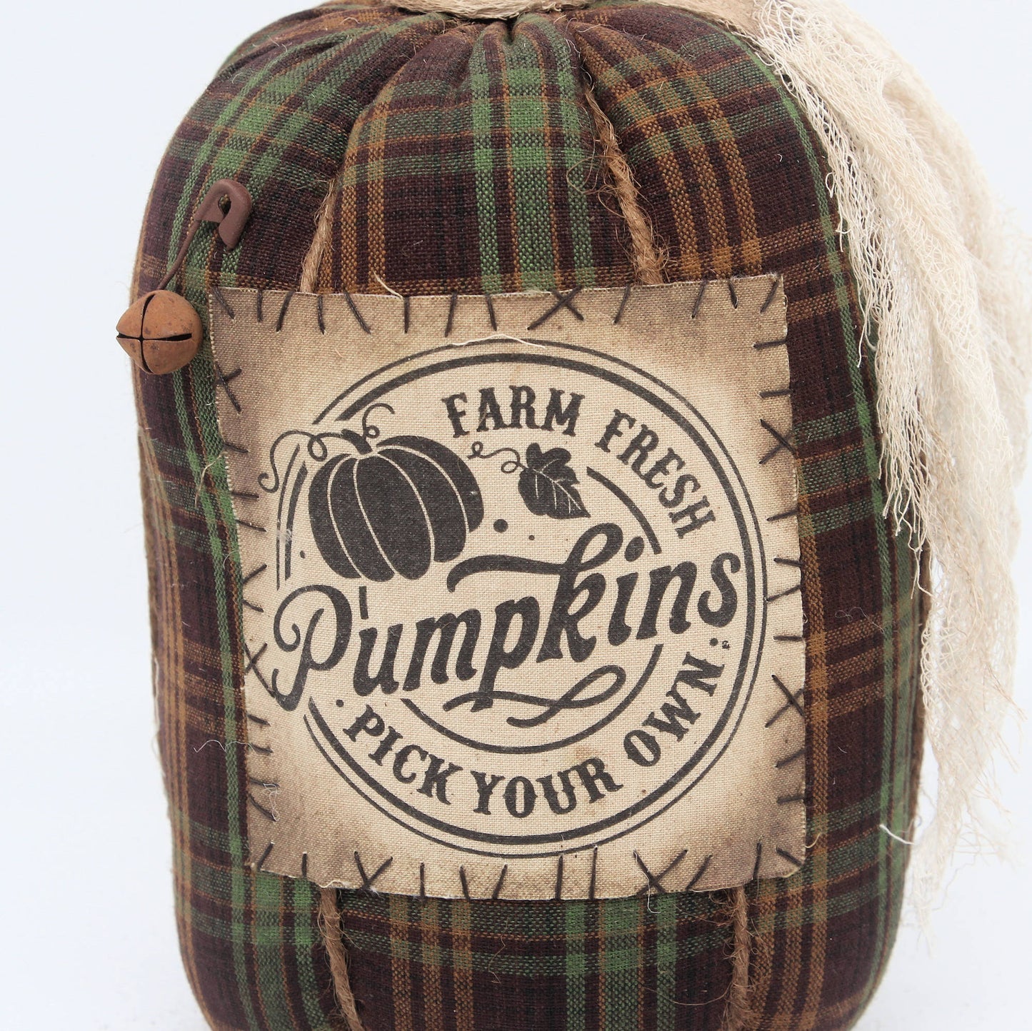 Fabric pumpkin with 'Farm Fresh Pumpkins Pick Your Own' label on a white background