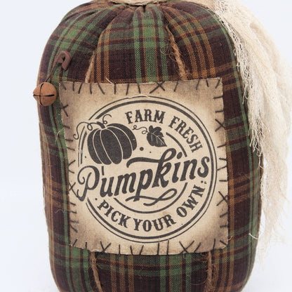 Fabric pumpkin with 'Farm Fresh Pumpkins Pick Your Own' label on a white background