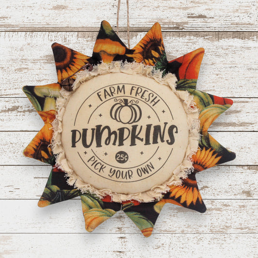 Handcrafted primitive fabric sunflower ornament with a panel for farm fresh pumpkins