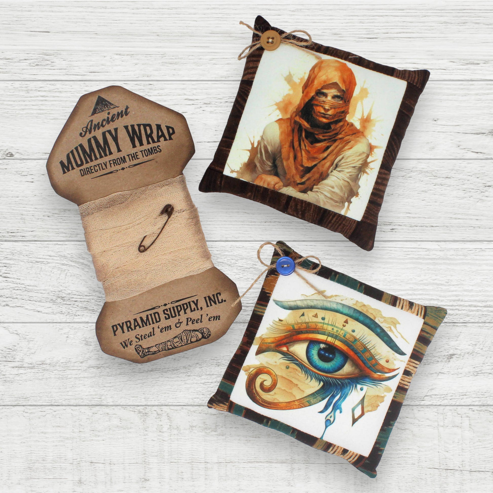 Handcrafted 3-piece set of ancient Egypt Halloween bowl fillers including two mini pillows and a card of cheesecloth mummy wrap