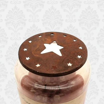 Rusty tin jar candle topper with folk art star design cutouts