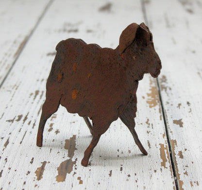miniature rusty tin sheep figure