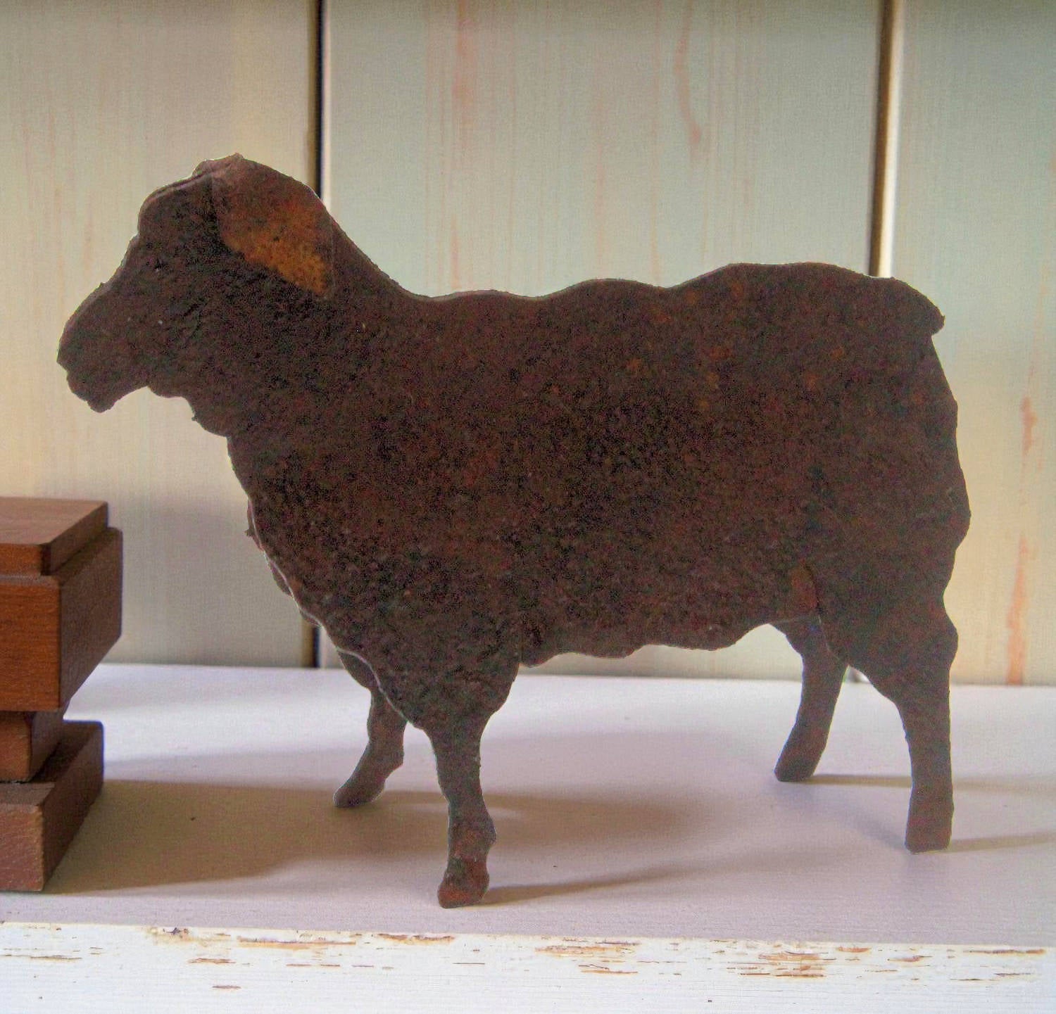 miniature rusty tin sheep figure