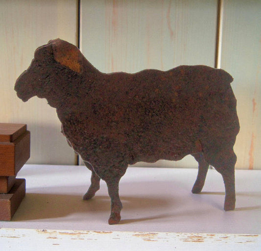 miniature rusty tin sheep figure