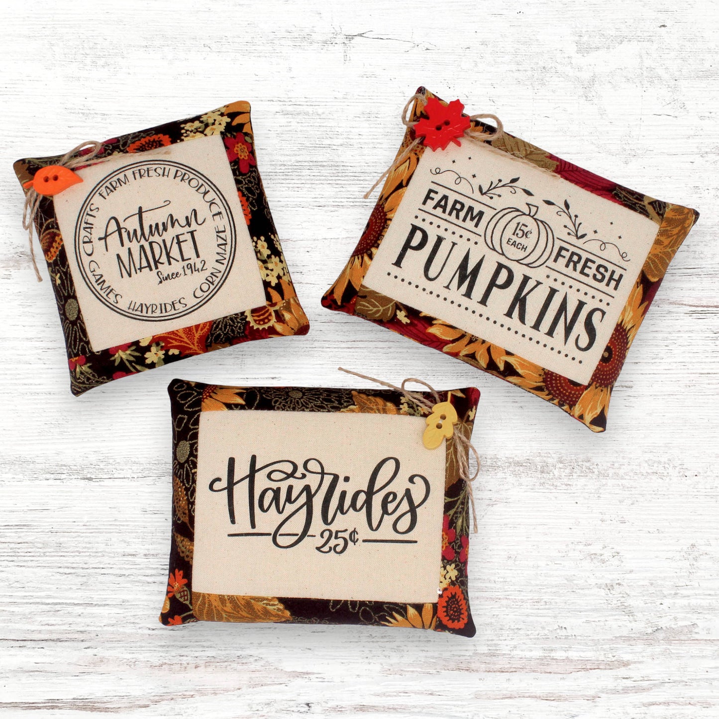 Set of three mini pillow bowl fillers with autumn-themed text and designs
