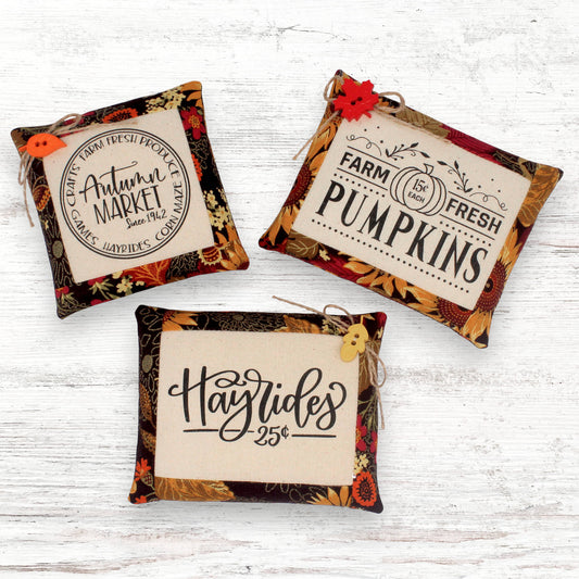 Set of three mini pillow bowl fillers with autumn-themed text and designs