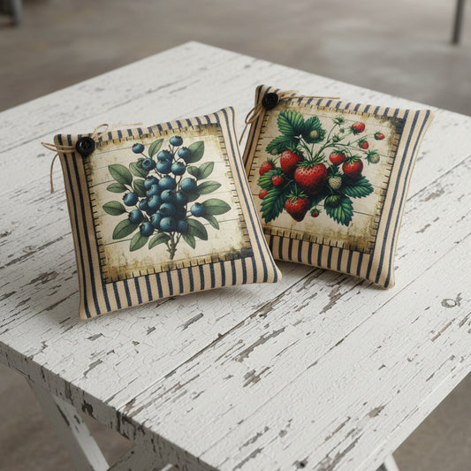Set of mini pillow bowl fillers with images of strawberries and blueberries on the vine