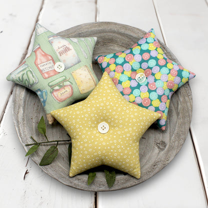 Set of three fabric stars bowl fillers with a pastel farmhouse kitchen theme
