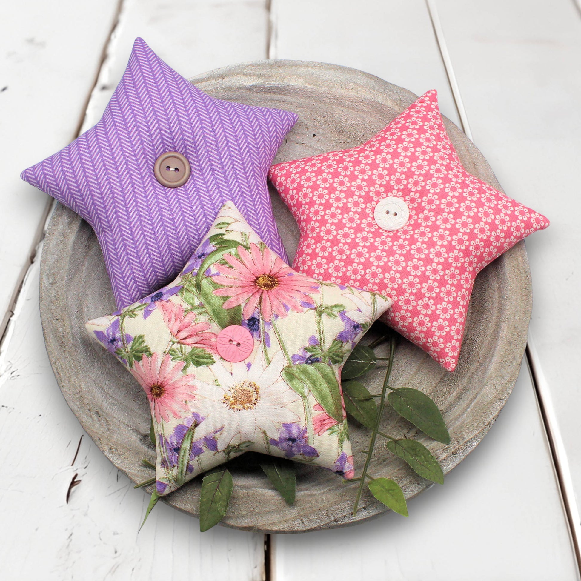 Set of three colorful spring fabric stars bowl fillers