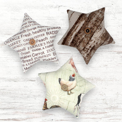 Set of three fabric stars with farmhouse-themed prints