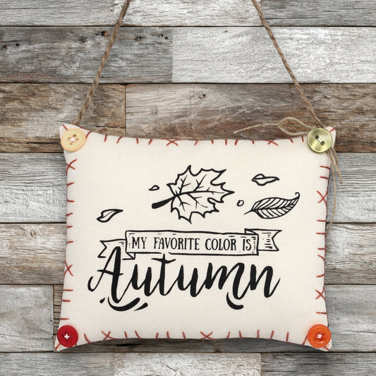 Fabric sign ornament reads 'my favorite color is autumn'