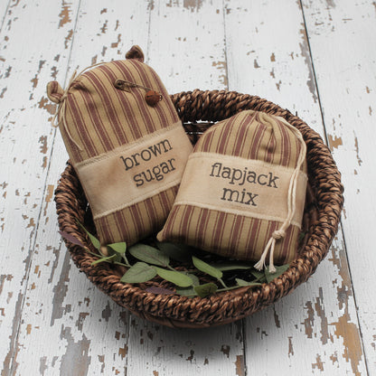 Set of two handcrafted country primitive bowl fillers for flapjack mix and brown sugar