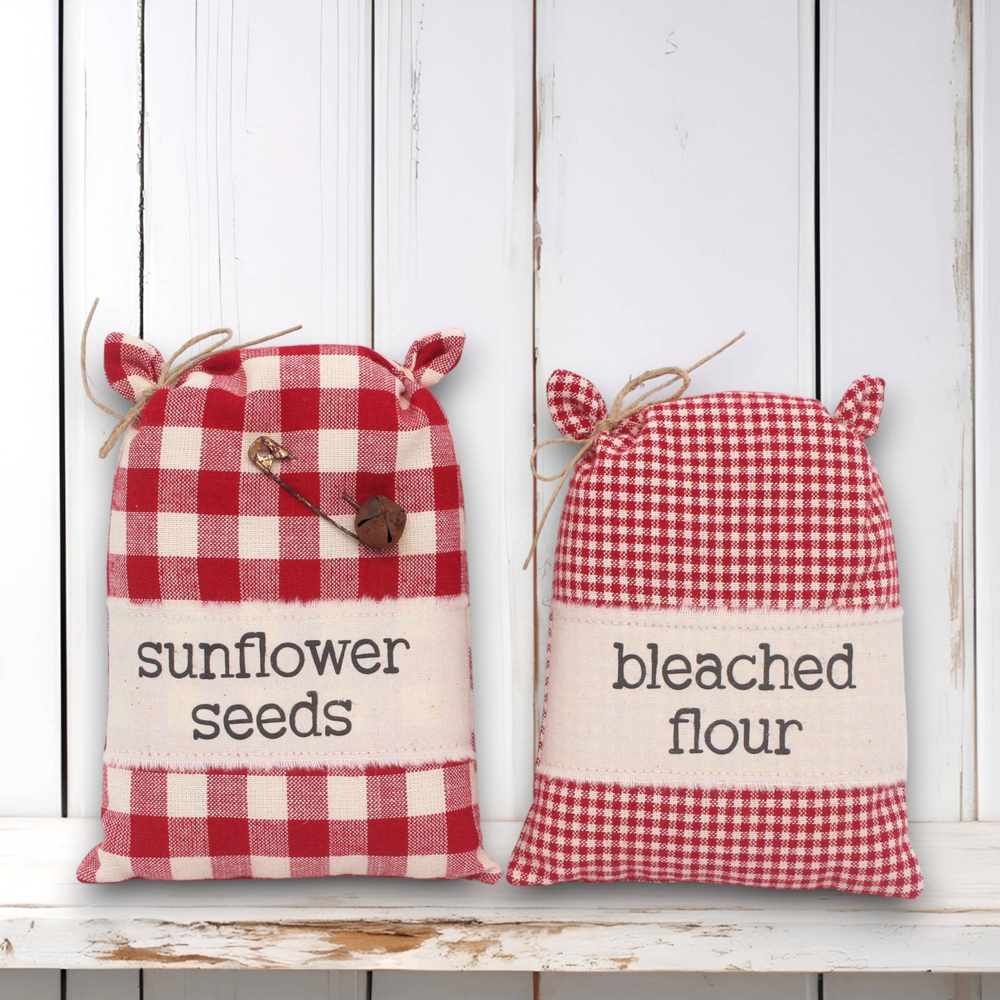 Set of two miniature grain sack style bowl fillers with sunflower seeds and bleached flour