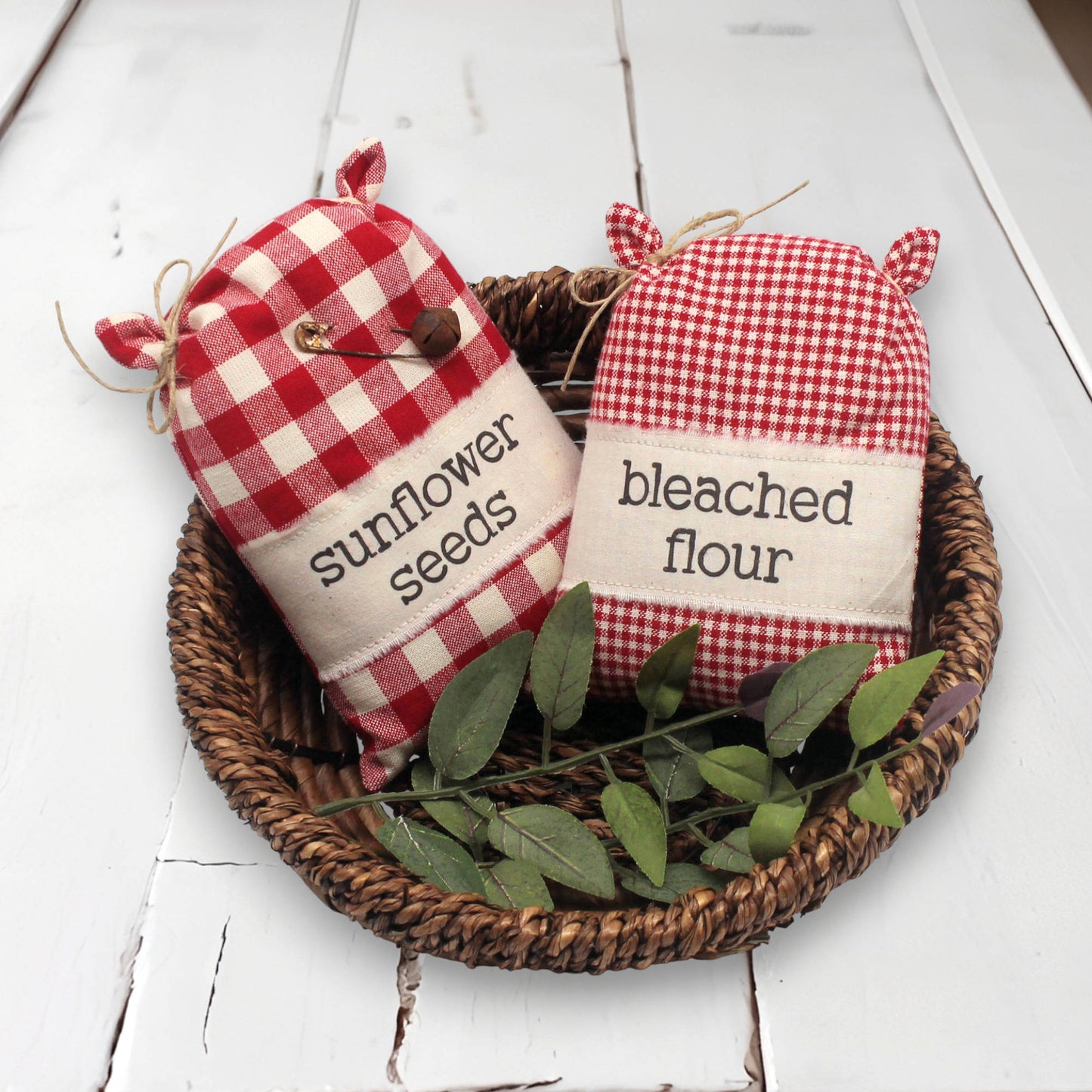 Set of two miniature grain sack style bowl fillers with sunflower seeds and bleached flour
