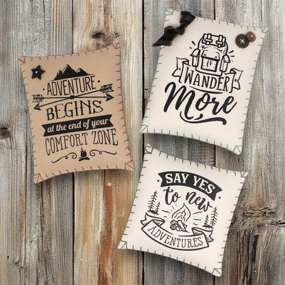 Set of three mini pillow bowl fillers with inspirational quotes about wandering and adventure