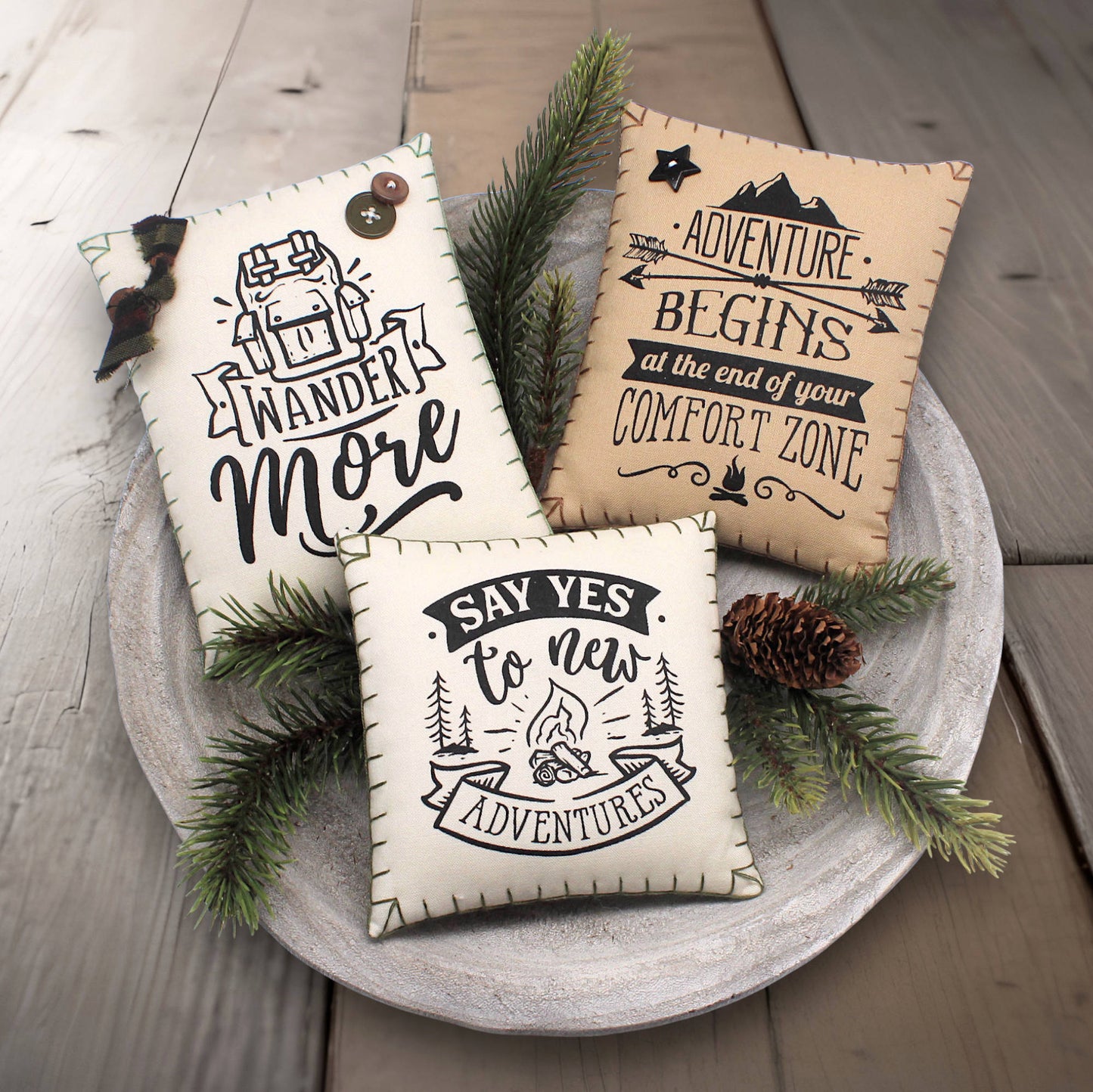 Set of three mini pillow bowl fillers with inspirational quotes about wandering and adventure