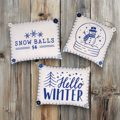Set of three mini pillow bowl fillers with snowman and winter-themed text and graphics