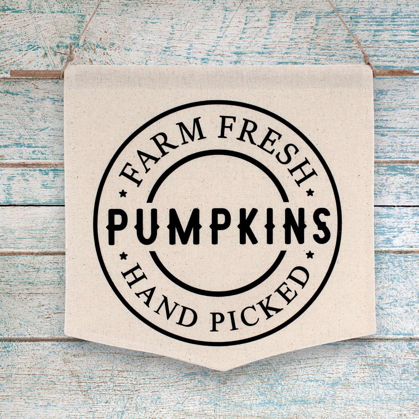 Unbleached muslin wall banner advertising farm fresh pumpkins
