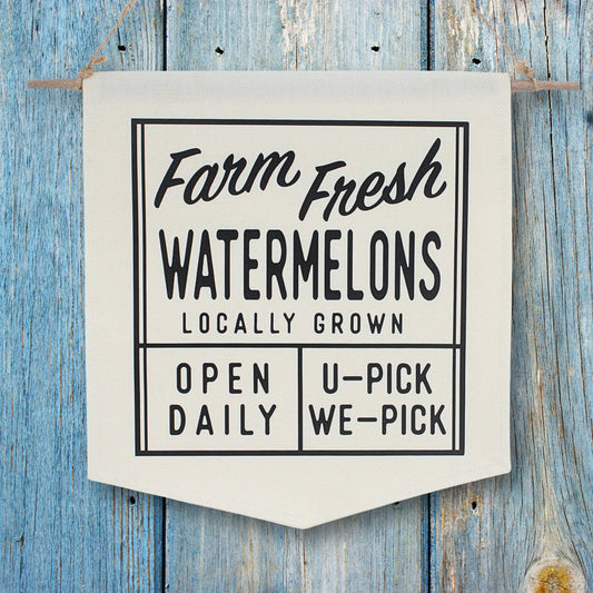 Farm fresh watermelons wall banner sign on a wooden background