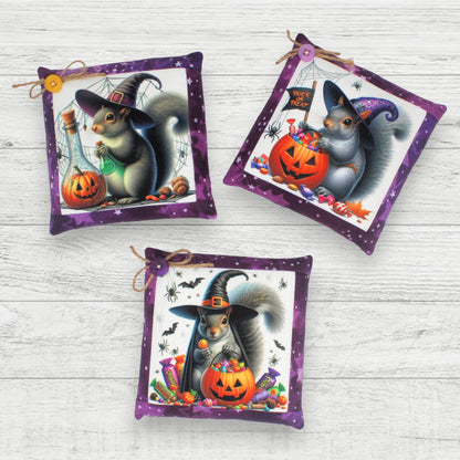 Set of three handmade miniature pillows with images of Halloween witch squirrels
