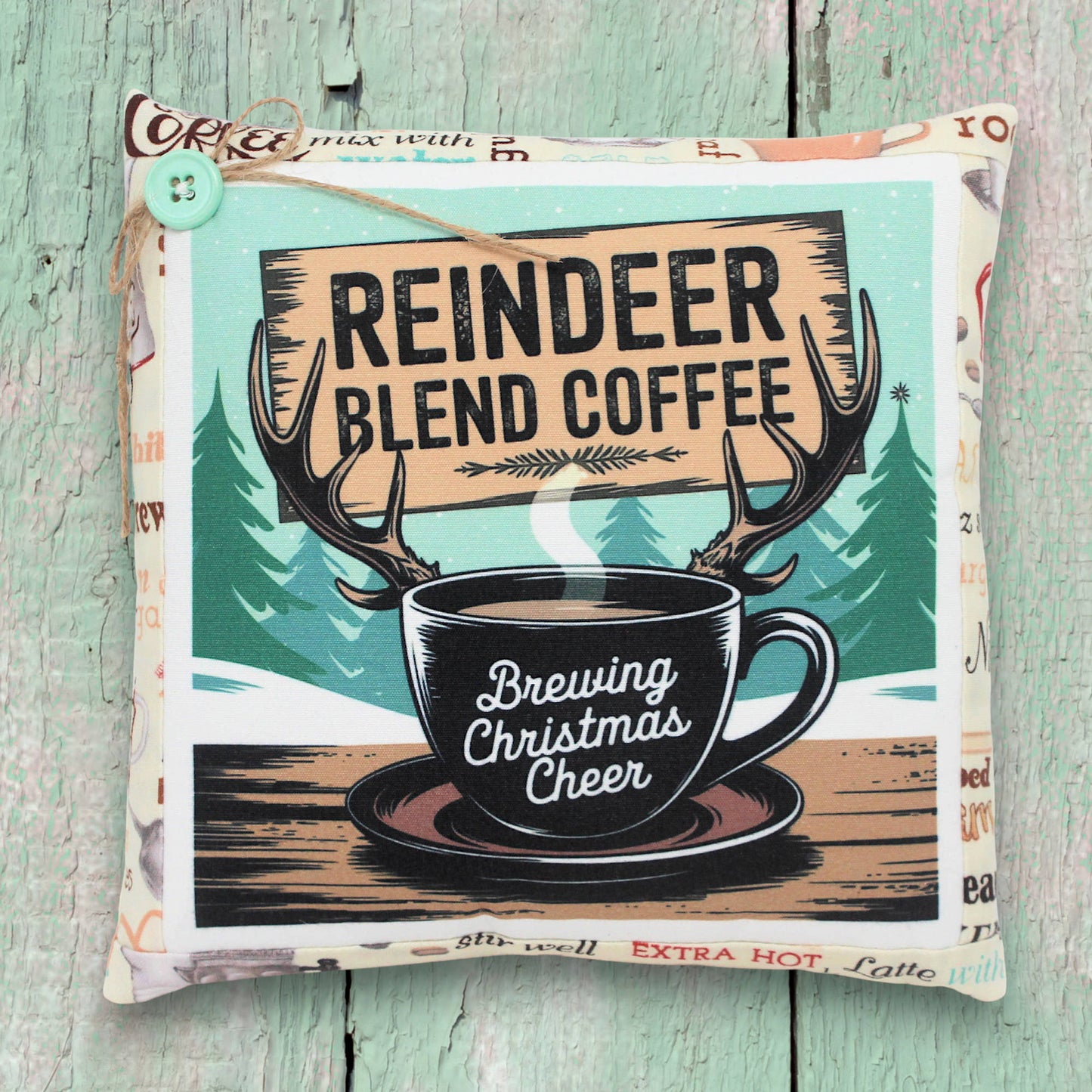 Small decorative pillow with a reindeer blend coffee design