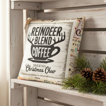 Decorative pillow with 'Reindeer Blend Coffee' text and design on a white background