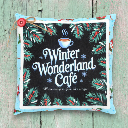 Decorative small pillow with a colorful Christmas winter wonderland cafe design
